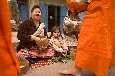 Monks collecting morning alms, alms givers, Luang Prabang, Laos, Indochina, Southeast Asia, Asia