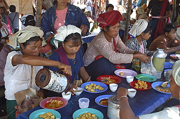 Eating at market, Nampam market, Inle Lake, Shan State, Myanmar (Burma), Asia