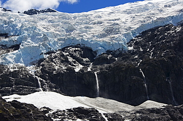 Water cascading off Rob Roy Glacier, Mount Aspiring National Park, Otago, South Island, New Zealand, Pacific