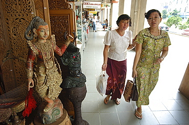 Souvenir shop, woman shopping on street, Yangon (Rangoon), Myanmar (Burma), Asia