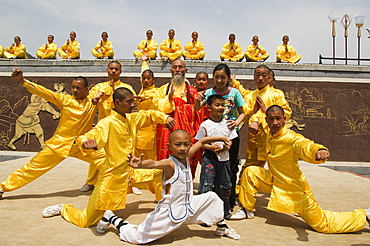 Kung fu students displaying their skills at a tourist show within Shaolin Temple, Shaolin is the birthplace of Kung Fu martial art, Shaolin, Henan Province, China, Asia