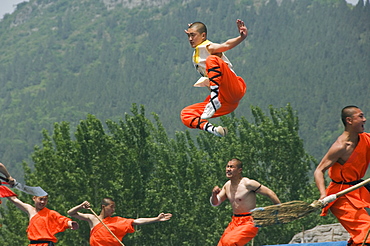 Kung fu students displaying their skills at a tourist show within Shaolin Temple, Shaolin, birthplace of Kung Fu martial art, Henan Province, China, Asia