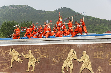 Kung fu students displaying their skills at a tourist show within Shaolin Temple, Shaolin, birthplace of Kung Fu martial art, Henan Province, China, Asia