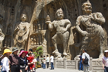 Carved Buddha images at Longmen Caves, Dragon Gate Grottoes, dating from the 6th to 8th Centuries, UNESCO World Heritage Site, Henan Province, China, Asia