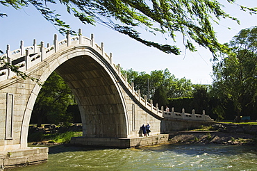 A steeply arched bridge on Lake Kunming at Yihe Yuan (The Summer Palace), UNESCO World Heritage Site, Beijing, China, Asia