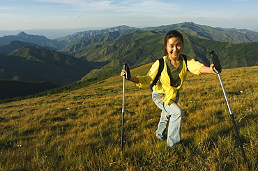 Mountain scenery and Chinese female hiker at Wutaishan (Five Terrace Mountain) one of China's sacred Buddhist mountain ranges, Shanxi province, China, Asia