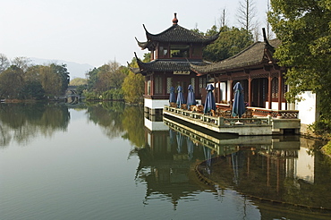 A waterside pavilion at Winding Garden at West Lake, Hangzhou, Zhejiang Province, China, Asia