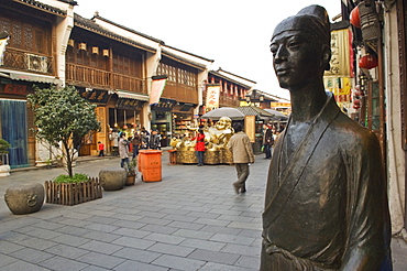 A bronze statue in Qinghefang Old Street in Wushan district of Hangzhou, Zhejiang Province, China, Asia