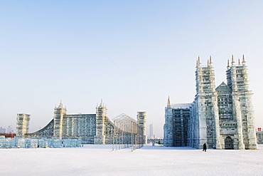 Replica ice sculptures of Notre Dame Cathedral and London's Tower Bridge at the Ice Lantern Festival, Harbin, Heilongjiang Province, Northeast China, China, Asia