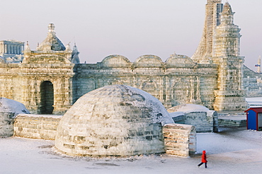 An igloo and snow and ice sculptures at the Ice Lantern Festival, Harbin, Heilongjiang Province, Northeast China, China, Asia