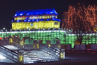 Snow and ice sculptures illuminated at night at the Ice Lantern Festival, Harbin, Heilongjiang Province, Northeast China, China, Asia