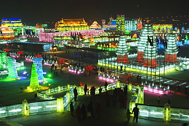 Snow and ice sculptures illuminated at night at the Ice Lantern Festival, Harbin, Heilongjiang Province, Northeast China, China, Asia