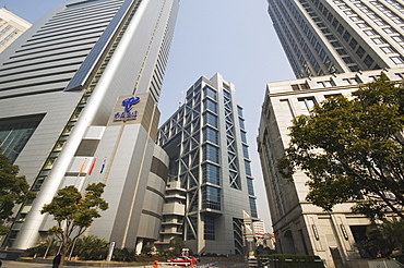 Shanghai Stock Exchange Building surrounded by skyscrapers in Pudong new area, Shanghai, China, Asia