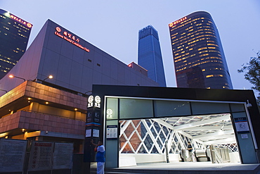 Subway station entrance in front of the World Trade Center Hotel and center buildings, Guomao district, Beijing, China, Asia