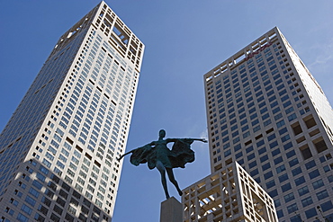 Statue of a woman among high office buildings in Guomao CBD, Beijing, China, Asia