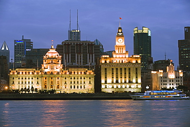 Historical colonial style buildings illuminated on The Bund, Shanghai, China, Asia