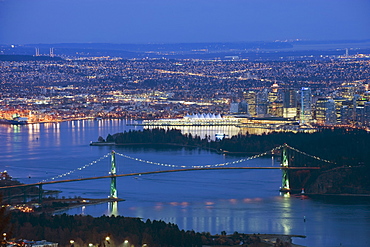 Night view of city skyline and Lions Gate Bridge, from Cypress Provincial Park, Vancouver, British Columbia, Canada, North America