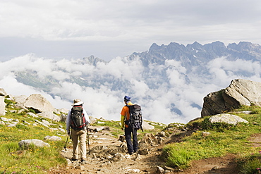 Hikers above Chamonix Valley, Rhone Alps, France, Europe