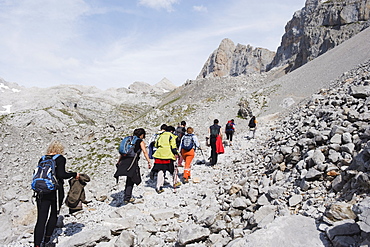 Hikers in Picos de Europa National Park, shared by the provinces of Asturias, Cantabria and Leon, Spain, Europe