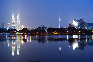 Petronas Towers and Istana Budaya National Theatre, Lake Titiwangsa, Kuala Lumpur, Malaysia, Southeast Asia, Asia