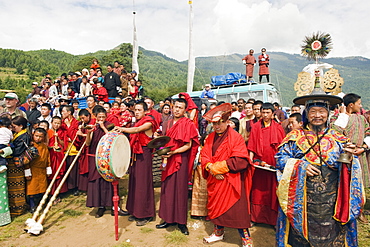 Monks and priest at Thangbi Mani Tsechu (festival), Jakar, Bumthang, Chokor Valley, Bhutan, Asia