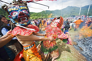 Dancers in costume at Thangbi Mani Tsechu (festival), Jakar, Bumthang, Chokor Valley, Bhutan, Asia
