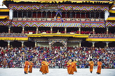 Dancers in traditional costume, Autumn Tsechu (festival) at Trashi Chhoe Dzong, Thimpu, Bhutan, Asia