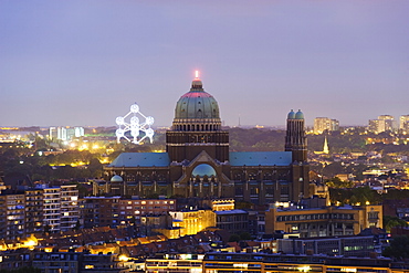 National Catholic Church and Atomium, panoramic view of the city illuminated at night, Brussels, Belgium, Europe