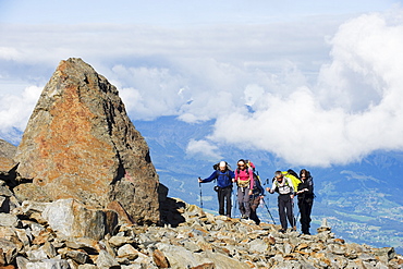 Hikers above Chamonix Valley, Mont Blanc Massif, French Alps, France, Europe