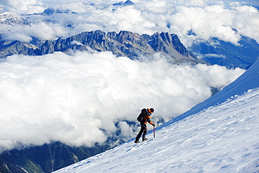 Climber on snow field, view from Mont Blanc, Chamonix, French Alps, France, Europe