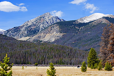 Couple hiking below Mount Baker, Rocky Mountain National Park, Colorado, United States of America, North America