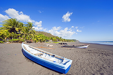 Fishing boats on the beach at Playa Sihuapilapa, Pacific Coast, El Salvador, Central America