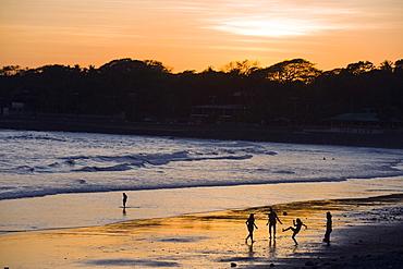 People playing football on the beach at La Libertad, Pacific Coast, El Salvador, Central America