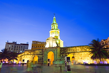 Old Town city wall and Puerto del Reloj at night, UNESCO World Heritage Site, Cartagena, Colombia, South America