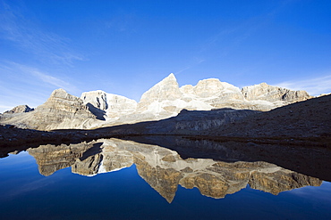 Reflection of mountains in Laguna de la Plaza, El Cocuy National Park, Colombia, South America