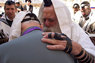 Man being blessed at the Western Wailing Wall, Old Walled City, Jerusalem, Israel, Middle East