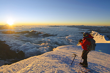 Climber on summit of Mont Blanc, Chamonix, Haute-Savoie, French Alps, France, Europe 