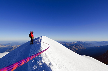 Climber on summit of Mont Blanc, Chamonix, Haute-Savoie, French Alps, France, Europe