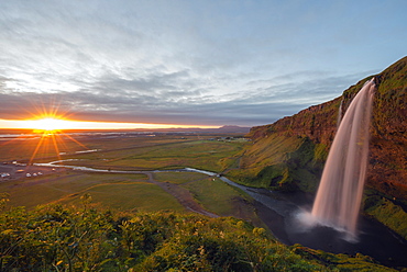 Seljalandsfoss waterfall at sunset, Southern Region, Iceland, Polar Regions