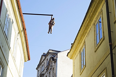 Hanging man above the street by David Cerny, Prague, Czech Republic, Europe