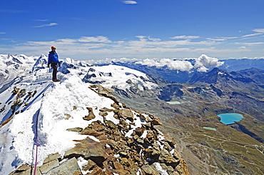 Climber on the summit of the Matterhorn, 4478m, Zermatt, Valais, Swiss Alps, Switzerland, Europe