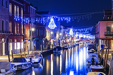 Christmas decoration on a canal at night, Murano, Venice, UNESCO World Heritage Site, Veneto, Italy, Europe