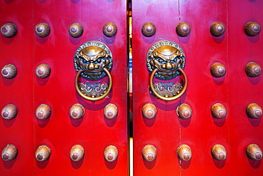 Dragon face door knockers, Buddha Tooth Relic temple, Chinatown, Singapore, Southeast Asia, Asia