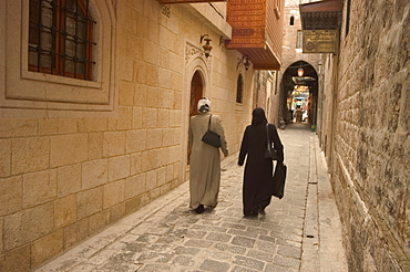 Syrian women walking through old town, Al-Jdeida, Aleppo (Haleb), Syria, Middle East