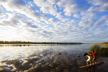 Clouds at sunset, Pangalanes Lakes canal system, Tamatave, eastern area, Madagascar, Africa