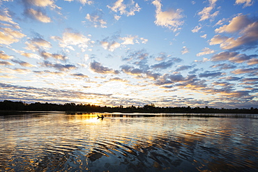 Clouds at sunset, Pangalanes Lakes canal system, Tamatave, Madagascar, Africa