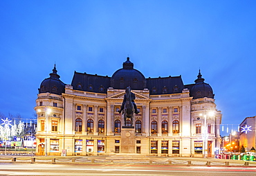 Central University library and statue of King Carol I of Romania, Bucharest, Romania, Europe