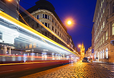 City tram lights heading towards The Powder Tower, Old Town, Prague, Czech Republic, Europe