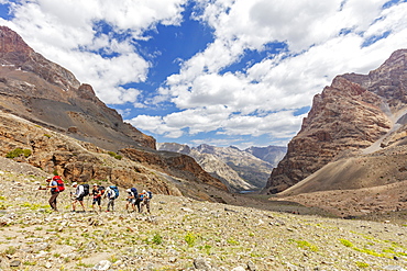 Trekkers on a mountain trail, Fan Mountains, Tajikistan, Central Asia, Asia