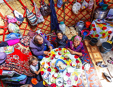 Local family in a yurt stay near Songkol lake, Kyrgyzstan, Central Asia, Asia